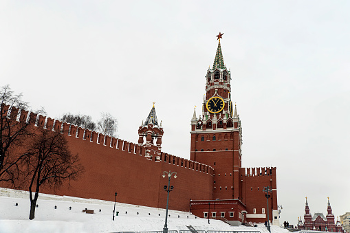 Spasskaya Tower of Moscow Kremlin at Red Square against the background of sky in Moscow. Russia