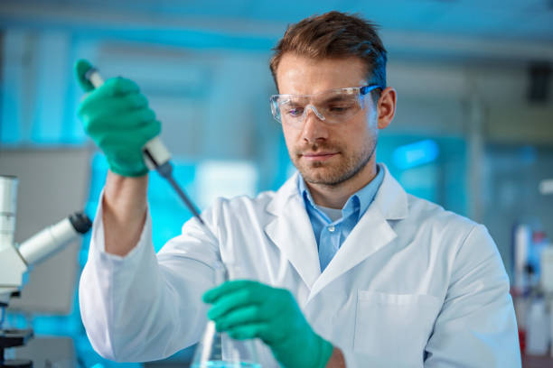 istock Mature Researcher During Chemical Experiment Using A Pipette 1453524905