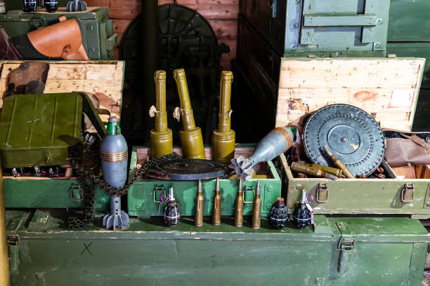istock various types of ammunition and military equipment in basement. 1453525856