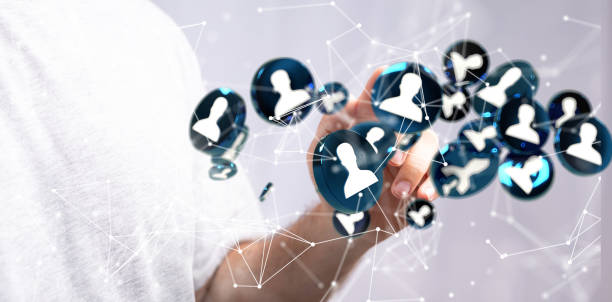 istock 3D rendering of human icons with hand tapping on it from behind-internet communication concept 1453528047