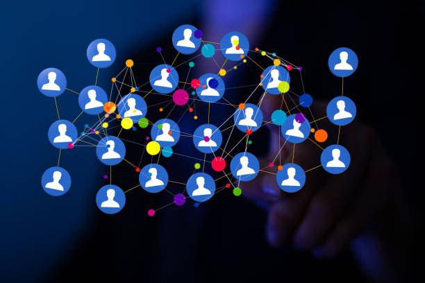 istock Network graphic with a person's hand touching the virtual screen from the background 1453532107