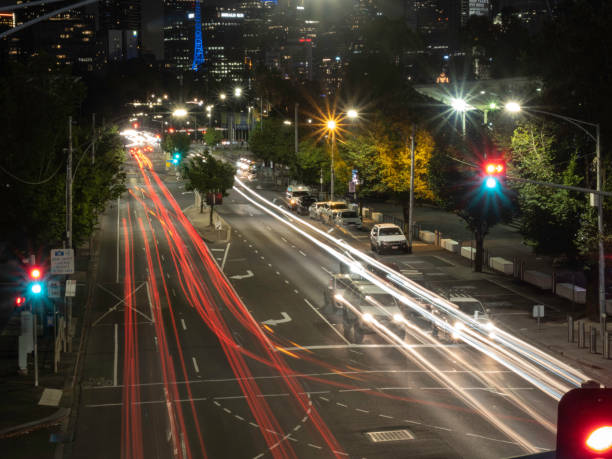 istock Car light trails on city streets 1453535375