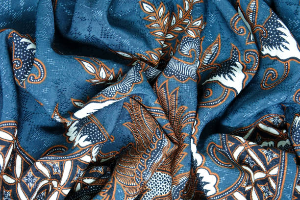 very beautiful batik cloth very beautiful batik cloth patterned with birds and flowers is a cultural characteristic of Indonesia batik indonesia stock pictures, royalty-free photos & images