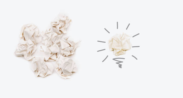 istock find better creative idea and innovation from paper concept, light bulb paper ball on light background 1453540946