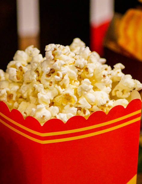 istock Close up of popcorn on a table 1453541703