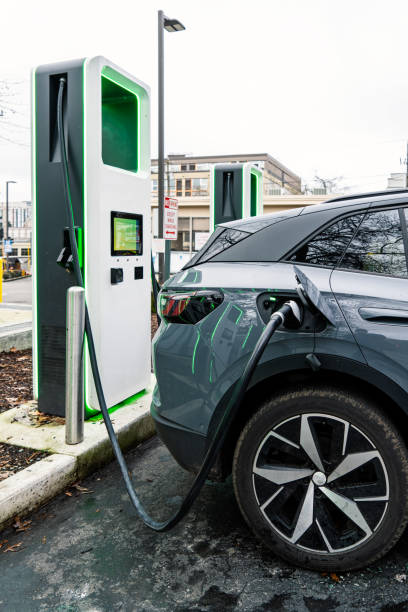 Car Being Charged in the City stock photo