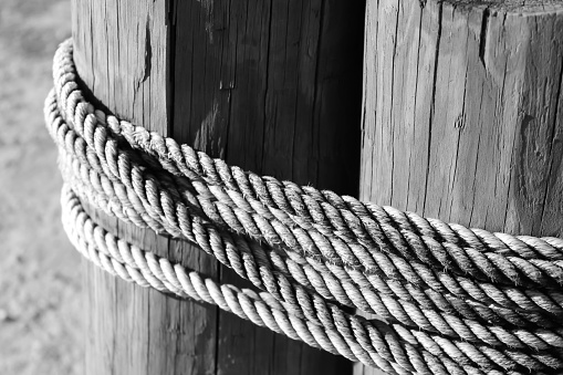 Ropes tied tightly around strong wood poles