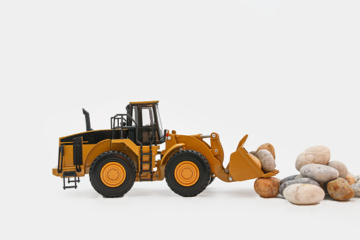 Wheel loader  on white background  ,With Stone scoop bucket lift up