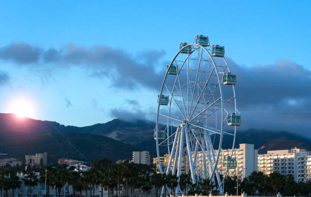 istock View of giant Ferris wheel at dusk 1453558384