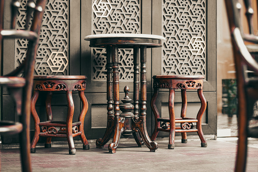 The wooden Chinese style table and chair
