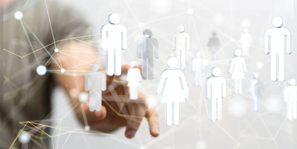 istock Network graphic with white icons with a person's hand touching it from the background 1453568187