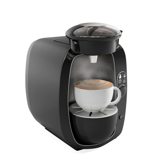 istock Black coffee machine with a cup of coffee in it isolated on the white background 1453571490