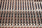 Closeup of a sound mixer control panel