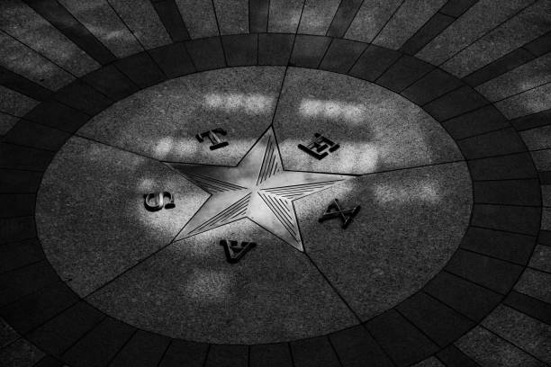 A grayscale shot of Texas star inside the Texas Capitol