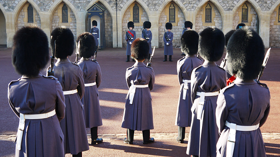 London, United Kingdom – March 04, 2017: The Grenadier Guards in purple uniforms in Windsor Castle in London, United Kingdom