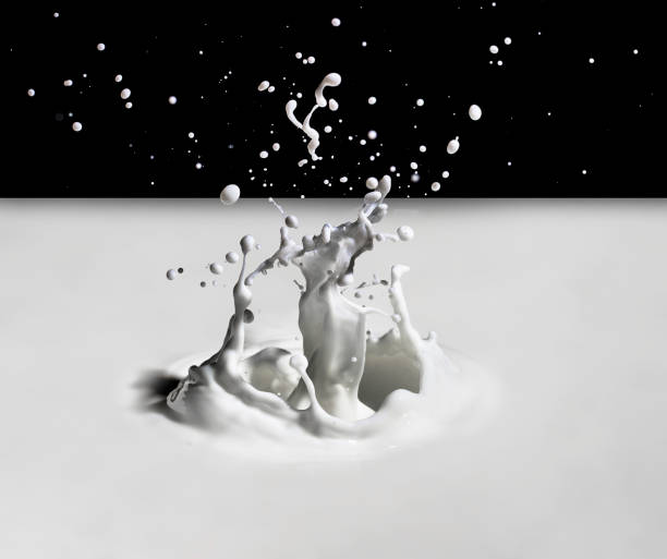 istock Closeup shot of white liquid splashes 1453577054