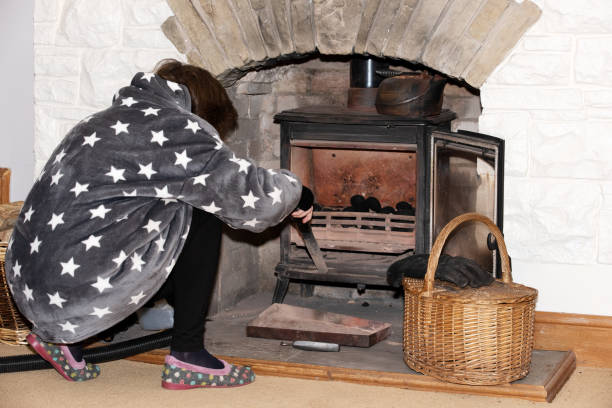 istock Hoovering the ash from the multifuel stove.2 1453577264