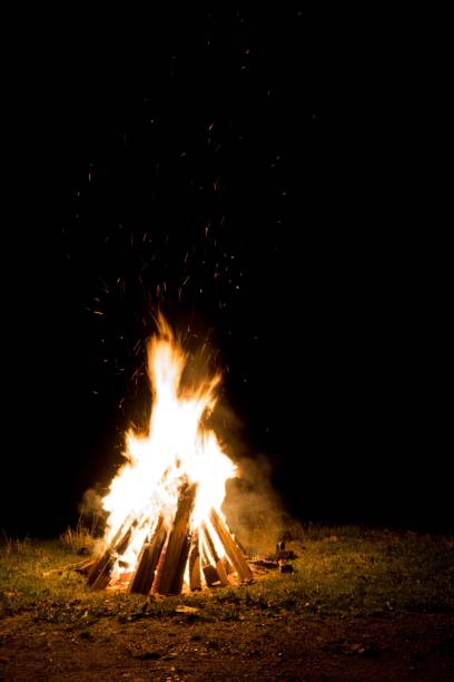 istock Vertical shot of a large burning bonfire in the night 1453579345
