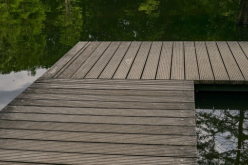 High angle shot of a wooden dock over a lake