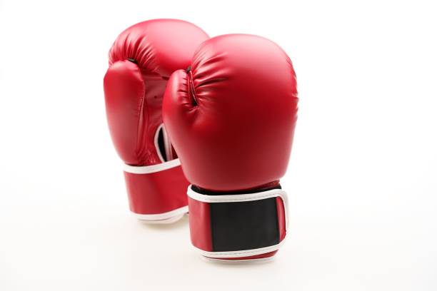 istock Pair of red boxing gloves isolated on a white background 1453580618