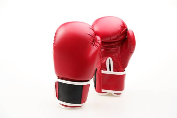 istock Pair of red boxing gloves isolated on a white background 1453580634