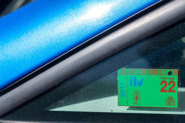 Closeup of ITV, vehicle technical inspection label 2022 ourense, Spain – April 07, 2022: A closeup of ITV, vehicle technical inspection label 2022 itv photos stock pictures, royalty-free photos & images