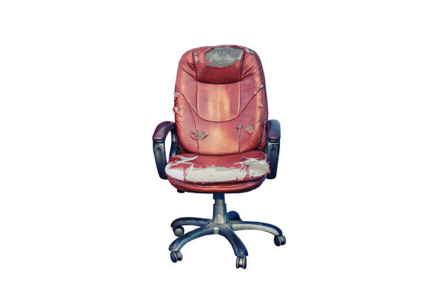 istock Old leather computer chair thrown into the street, bankrupt concept and business problems, isolated on a white background 1453582341