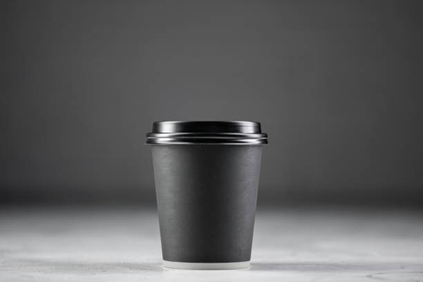 istock Paper cup of coffee on white background 1453589486