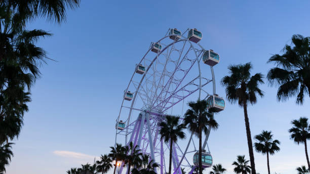 istock View of giant Ferris wheel at dusk 1453594150