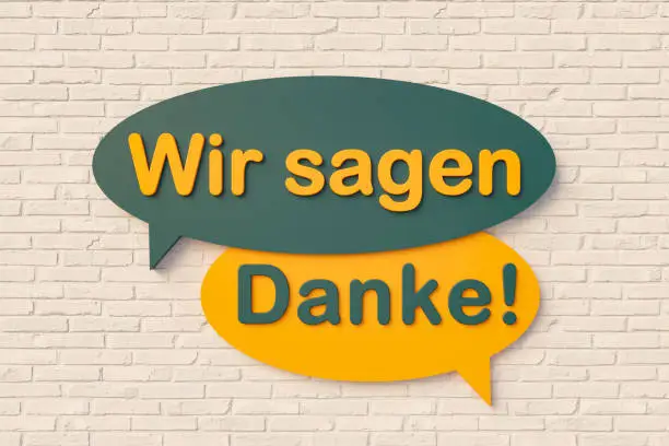 Photo of Wir sagen danke! (we say thank you) Cartoon speech bubble.