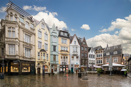 Aachen, Germany, December 23, 2022; Münsterplatz, square with old historic buildings on a rainy day in the center of Aachen.