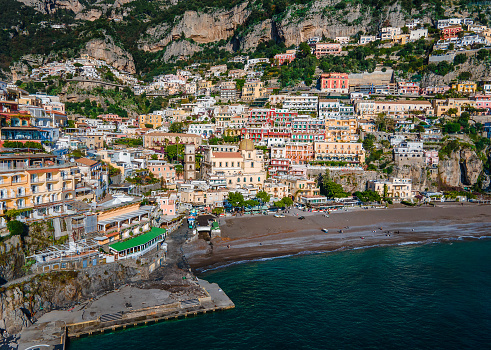 Aerial skyline view of Positano a famous travel destination in Southern Italy on the scenic Amalfi coast characterized by high cliffs and rocks