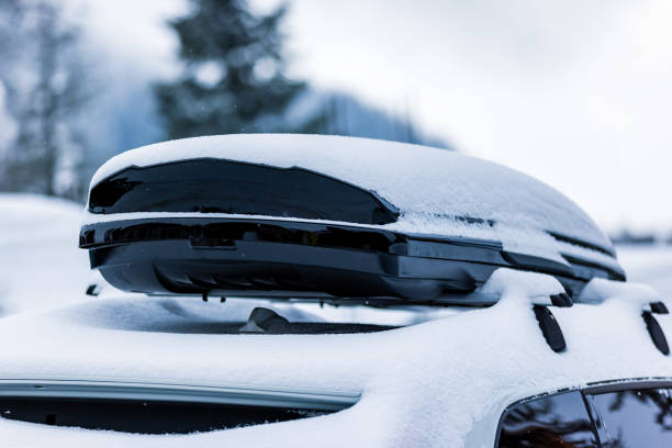 istock Roof rack with cargo box in winter 1453595975