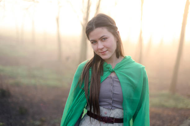 istock Young woman posing in medieval clothing 1453597844