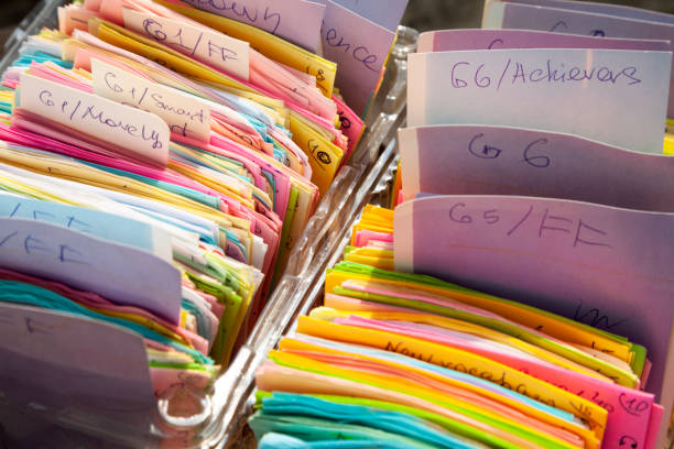 a colorful index card organized in rows and stored in boxes - untidy text imagens e fotografias de stock