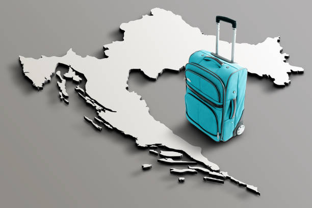 Blue suitcase on blank 3d map of Croatia. Copy space. No people. Horizontal orientation.