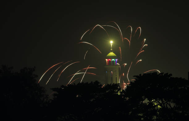 istock Beautiful fireworks in the sky behind mosque minaret. 1453602717