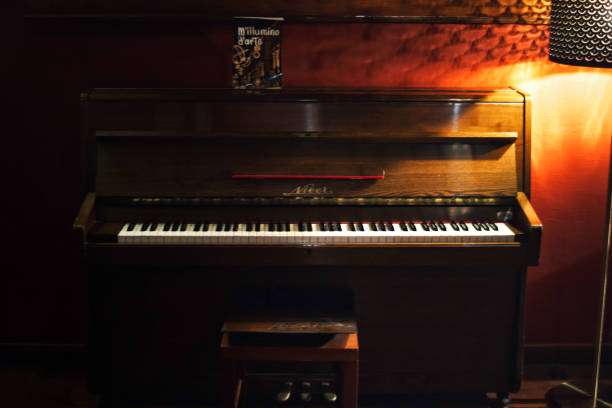 istock Wood piano in low light 1453603713