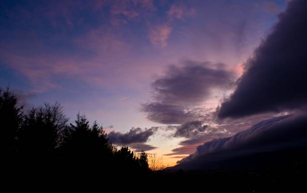 istock Silhouette of trees with epic sunset sky color 1453604639