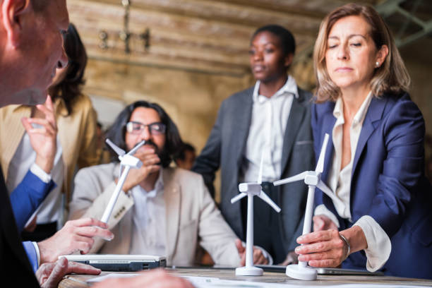 istock Renewable energy company meeting talking about green and low-pollution technology 1453608611