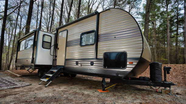 istock Camper trailer in a North Carolina forest 1453608894