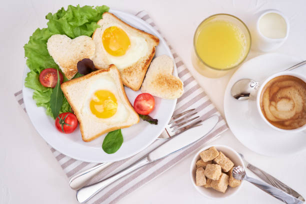 istock Fried Egg on Toast Bread and cup of fresh hot coffee on light grey background 1453609060