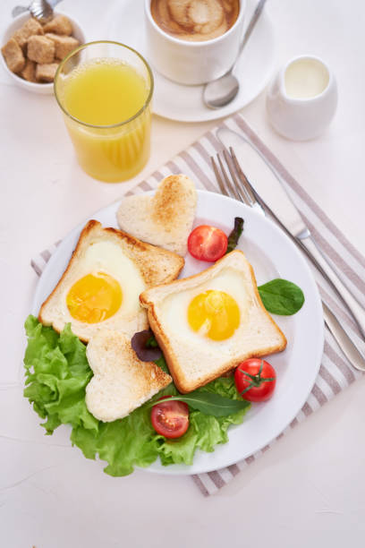 istock Fried Egg on Toast Bread and cup of fresh hot coffee on light grey background 1453609067