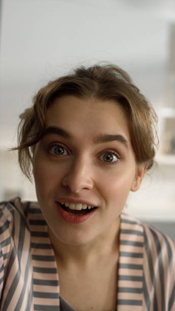 istock Closeup woman chatting webcam social media at home. Impressed face expression 1453609352