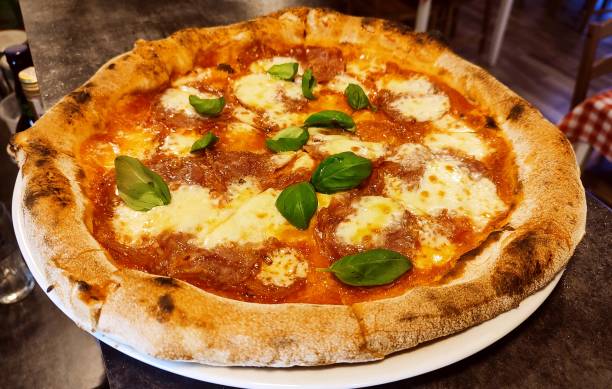 istock Italian pizza with salami 1453609618