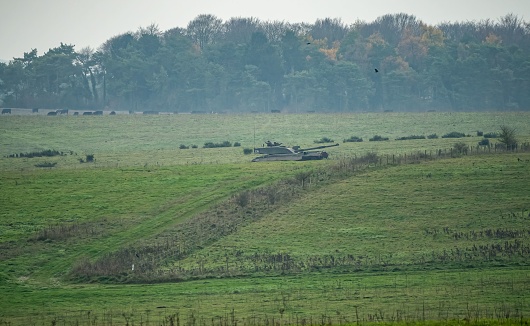 An aArmy battle tanks in action on a military combat exercise