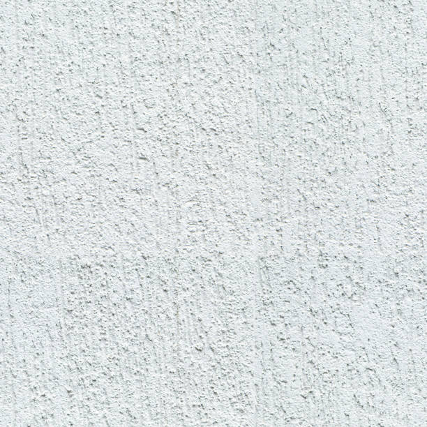 istock Seamless pattern of White stucco concrete plaster cement background 1453615788