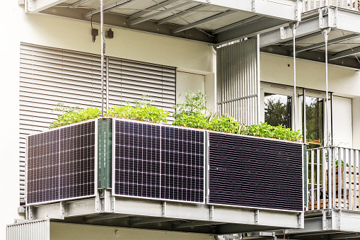 Solar panels on Balcony of Apartment Building. Modern Balcony Apartment Solar power panel.