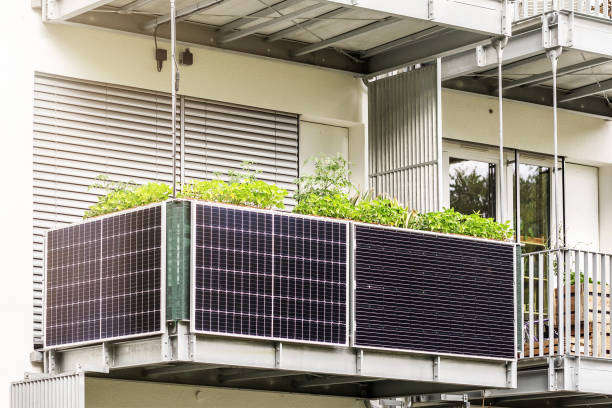 Modern Balcony Apartment Solar power panel. Solar panels on Balcony of Apartment Building. Modern Balcony Apartment Solar power panel. power station stock pictures, royalty-free photos & images