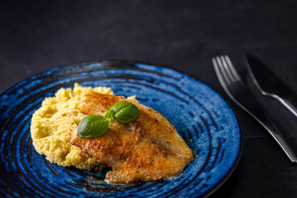 istock spicy fillet of white cod with couscous 1453626950